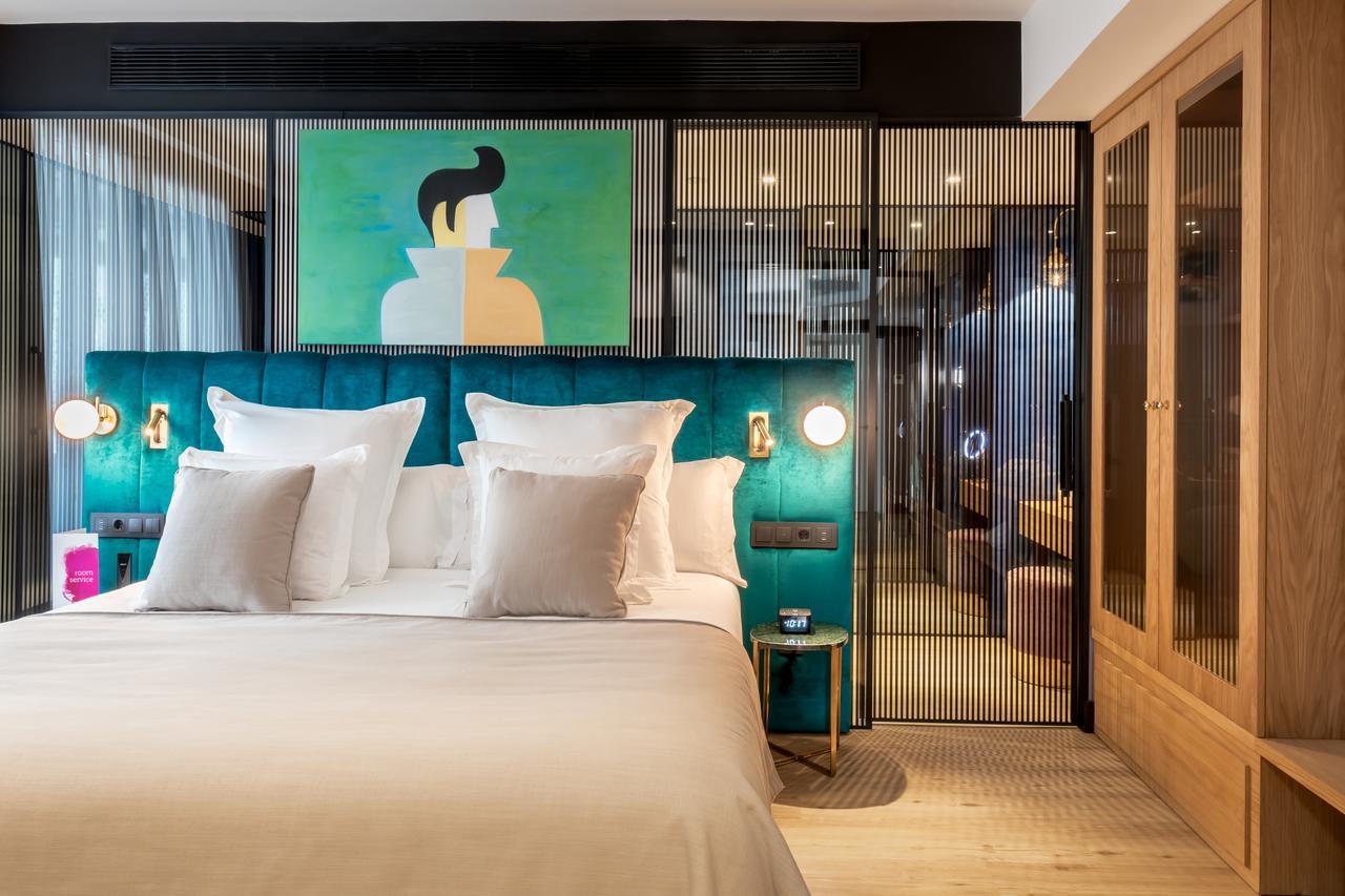 فندق بارثيللو إيماخينيه مدريد المظهر الخارجي الصورة A bedroom at the hotel